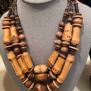 THREE STRAND WOODEN BEAD NECKLACE